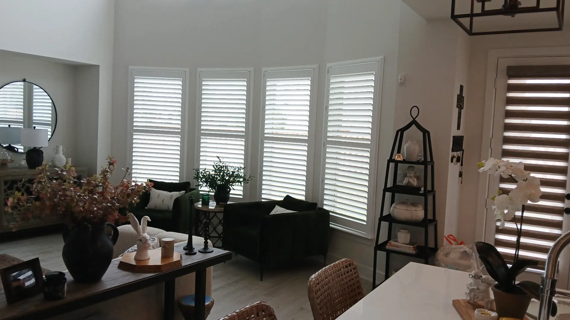 Custom plantation shutters in a sunlit Texas living room