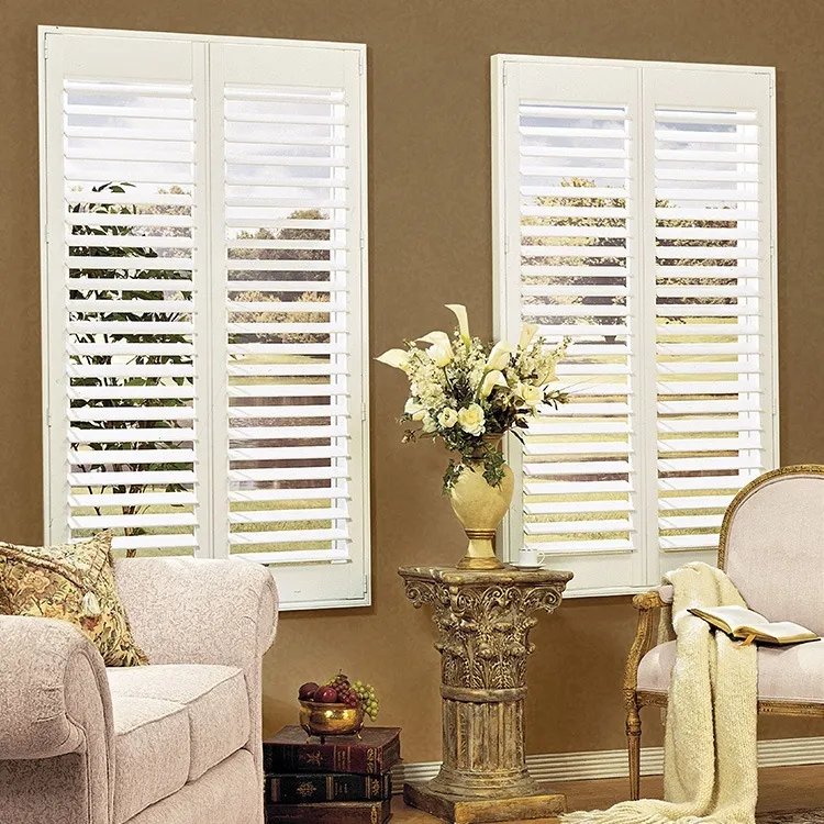 White plantation shutters flanking a pedestal in a warm living room
